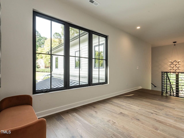 empty room featuring wood-type flooring