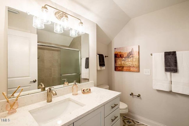 bathroom with vanity, vaulted ceiling, toilet, and walk in shower