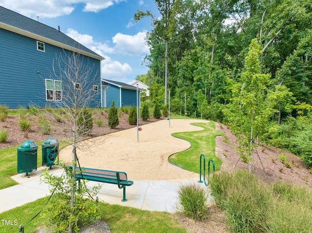 view of home's community with a lawn