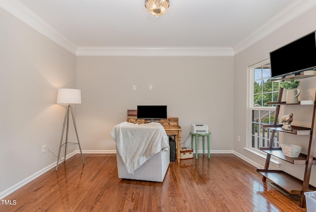 interior space featuring crown molding and hardwood / wood-style floors