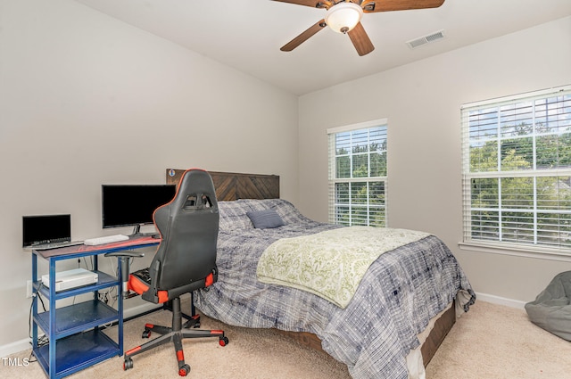 bedroom featuring ceiling fan and carpet floors