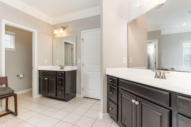 bathroom with tile floors, ornamental molding, large vanity, and double sink