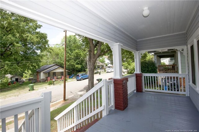 view of patio featuring a porch