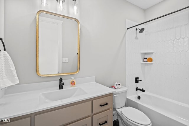 full bathroom featuring shower / washtub combination, vanity, and toilet