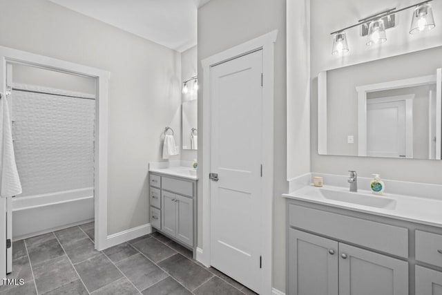 bathroom with tile patterned floors, vanity, and bathtub / shower combination