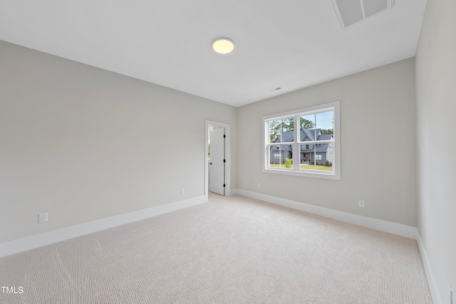 view of carpeted spare room