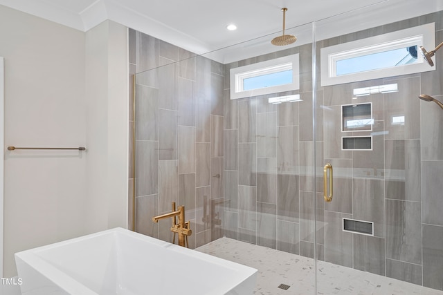 bathroom with crown molding, independent shower and bath, and sink