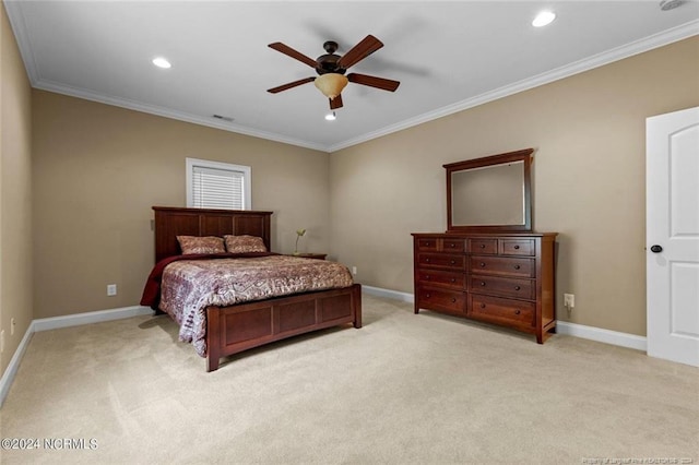 bedroom with ceiling fan, crown molding, and carpet flooring