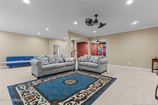 interior space featuring crown molding, carpet, and ceiling fan