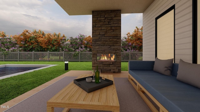 view of patio / terrace featuring fence and an outdoor living space with a fireplace