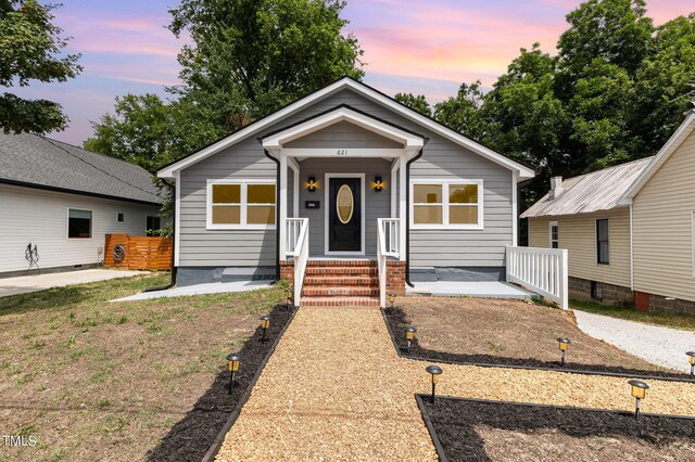 bungalow featuring covered porch