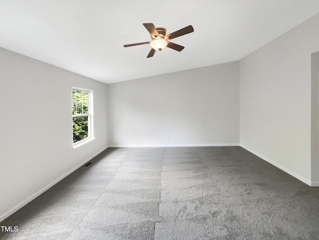 unfurnished room featuring carpet flooring and ceiling fan