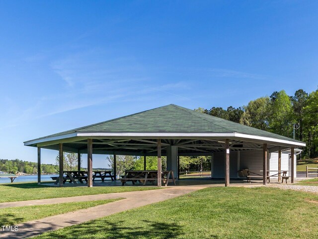 view of property's community featuring a lawn and a gazebo