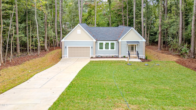 ranch-style home featuring a garage and a front yard