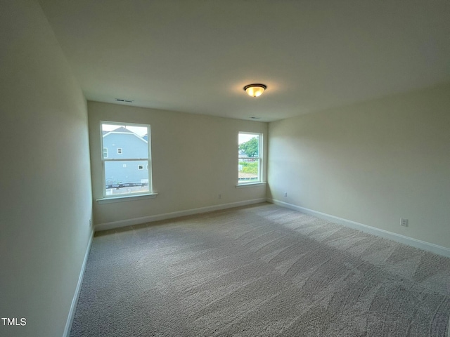 view of carpeted spare room