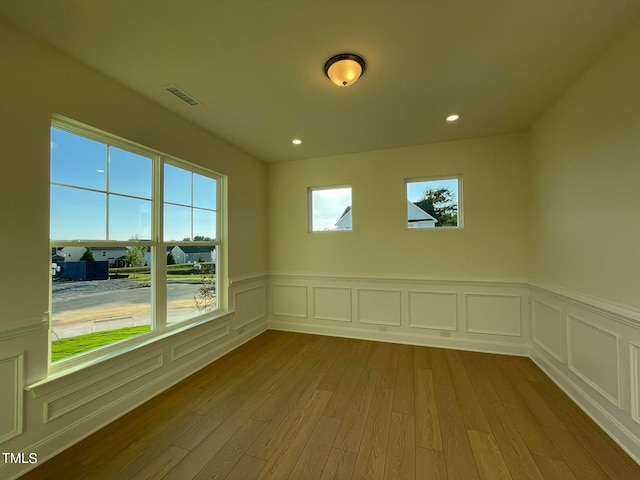 unfurnished room featuring light hardwood / wood-style flooring