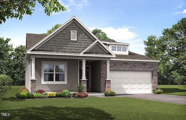 craftsman-style home featuring a front yard, a garage, and covered porch