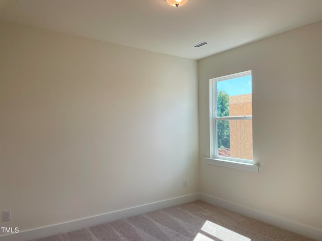 view of carpeted spare room