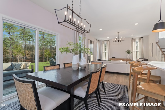 dining room with hardwood / wood-style flooring