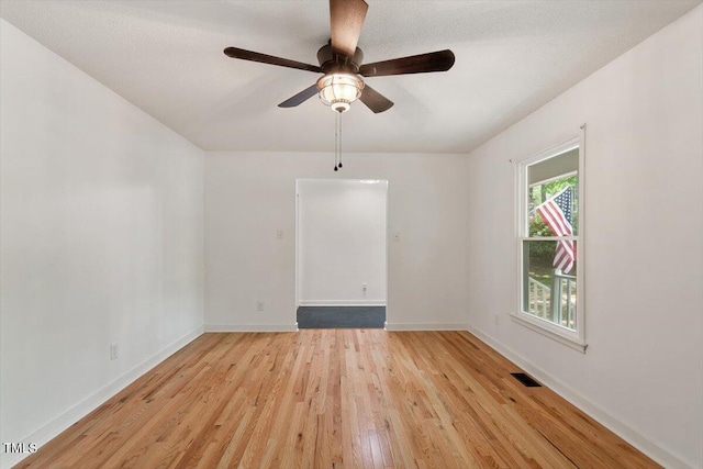 104 Argyle Ct, Garner, NC 27529 - unfurnished room with light wood-type flooring, baseboards, visible vents, and ceiling fan