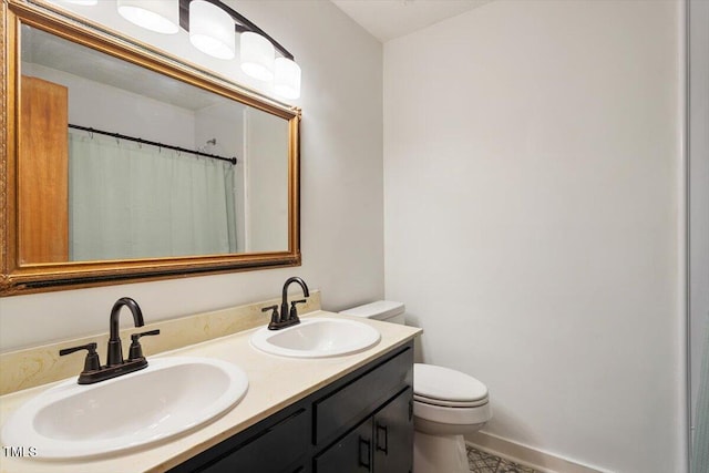 104 Argyle Ct, Garner, NC 27529 - full bathroom with curtained shower, a sink, double vanity, and toilet