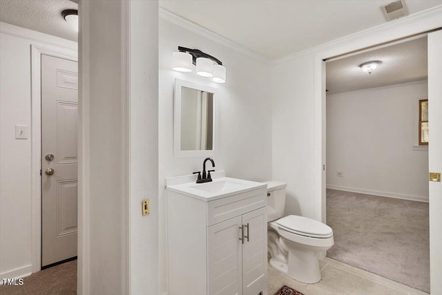 104 Argyle Ct, Garner, NC 27529 - half bath with visible vents, toilet, vanity, ornamental molding, and baseboards