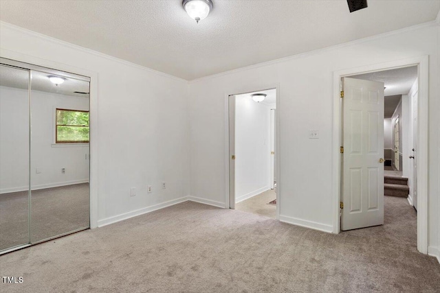 104 Argyle Ct, Garner, NC 27529 - unfurnished bedroom featuring baseboards, crown molding, and carpet flooring