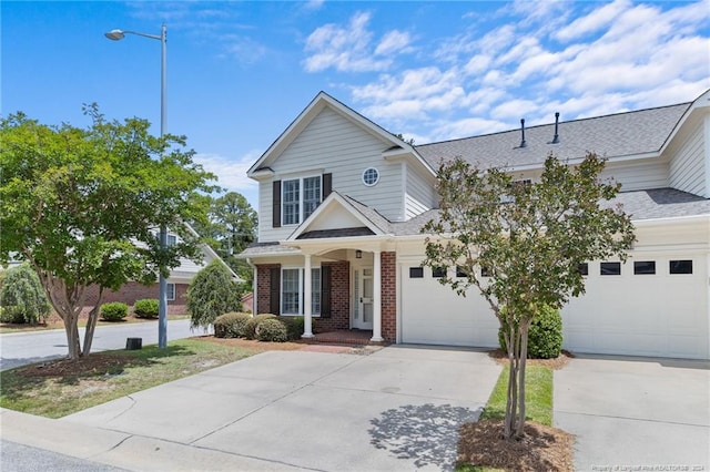 view of front of property with a garage