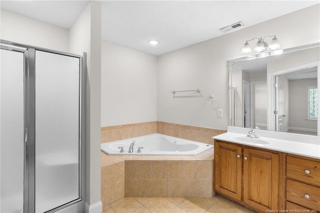 bathroom featuring separate shower and tub, tile patterned flooring, and vanity