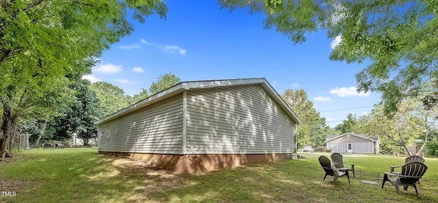 view of property exterior featuring a yard