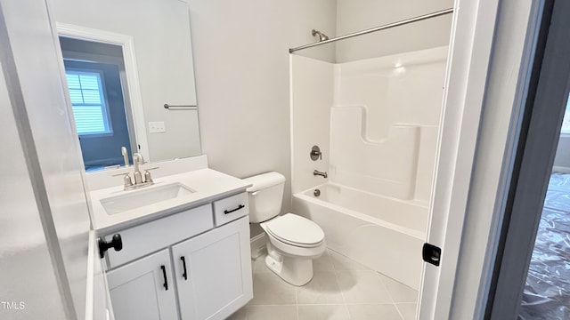 full bathroom with tile patterned flooring, vanity, washtub / shower combination, and toilet