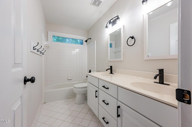 full bathroom with vanity, shower / tub combination, tile patterned floors, and toilet