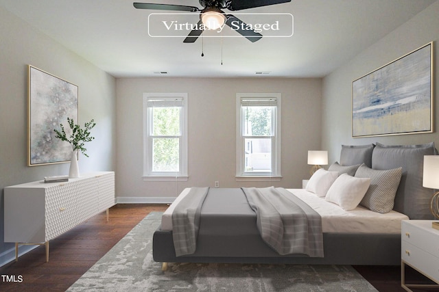 bedroom featuring ceiling fan and dark wood-type flooring