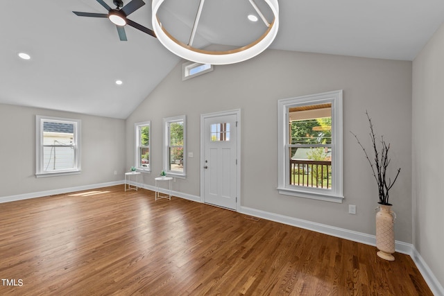 entryway featuring wood-type flooring, vaulted ceiling, ceiling fan, and a healthy amount of sunlight