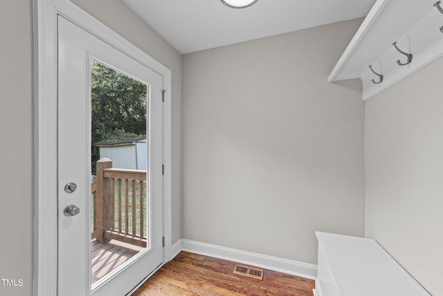 mudroom with hardwood / wood-style flooring