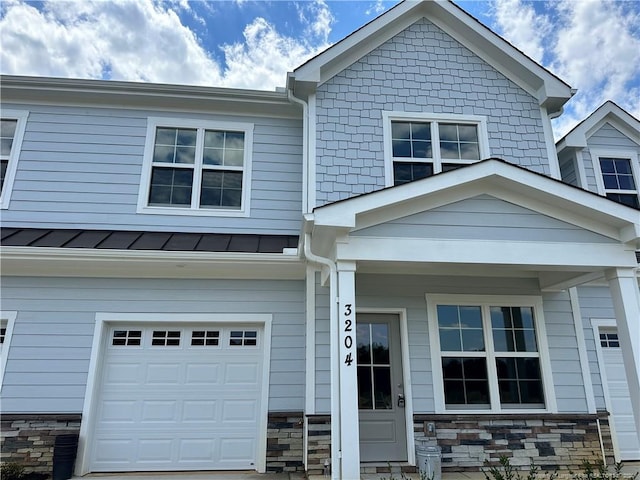 view of front of property with a garage