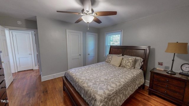 bedroom featuring ceiling fan and dark hardwood / wood-style flooring