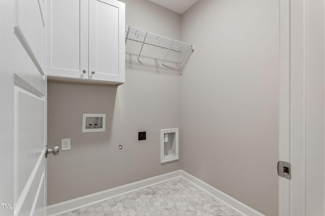3097 Banks School Rd, Kinston, NC 28504 - clothes washing area featuring washer hookup, hookup for an electric dryer, baseboards, hookup for a gas dryer, and cabinet space