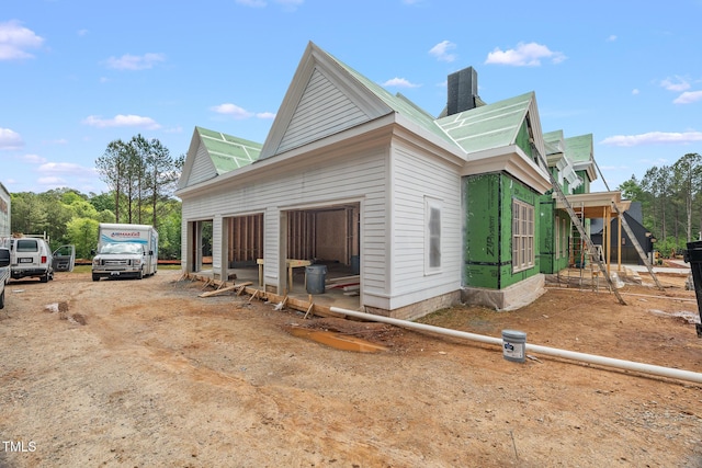 4812 Parker Meadow Dr, Raleigh, NC 27614 - view of home's exterior with a chimney