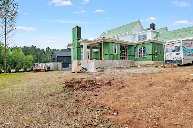 4812 Parker Meadow Dr, Raleigh, NC 27614 - view of home's exterior featuring a chimney