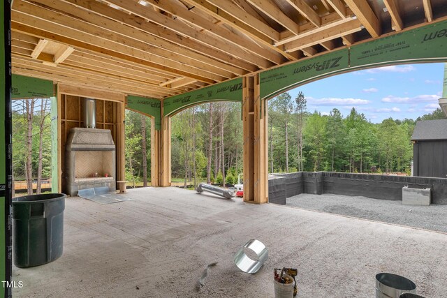 4812 Parker Meadow Dr, Raleigh, NC 27614 - view of patio featuring a wooded view