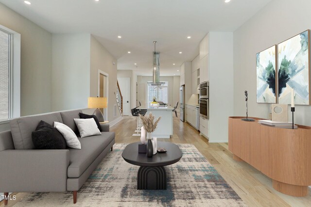 living room with light hardwood / wood-style flooring