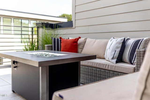 view of patio featuring an outdoor fire pit