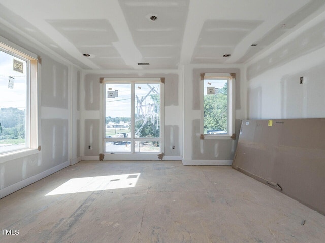 spare room featuring a wealth of natural light