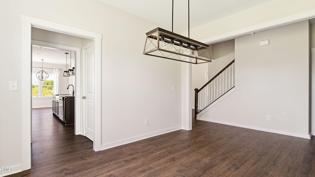 interior space featuring dark wood-type flooring and sink