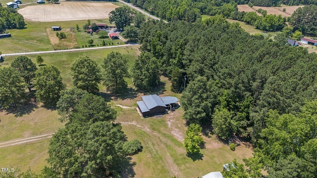 birds eye view of property featuring a rural view