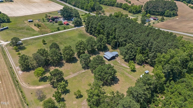 birds eye view of property featuring a rural view