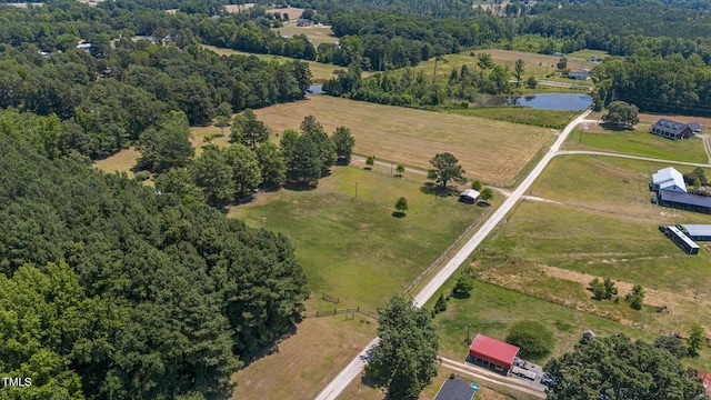 drone / aerial view featuring a rural view and a water view