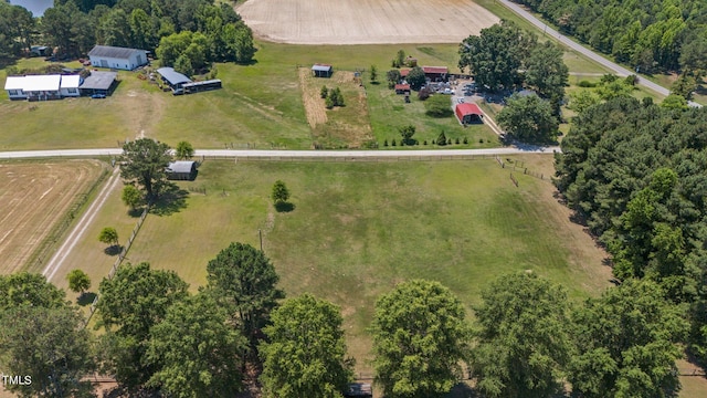 birds eye view of property featuring a rural view