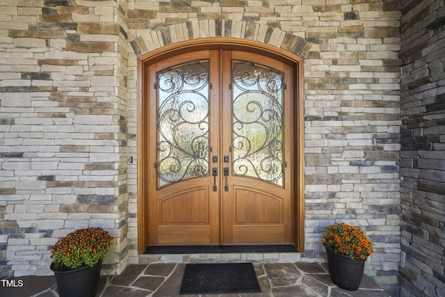 doorway to property featuring french doors